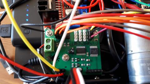 white and yellow cables going to MakerHwak ReSpeaker 2 Mic Pi Hat